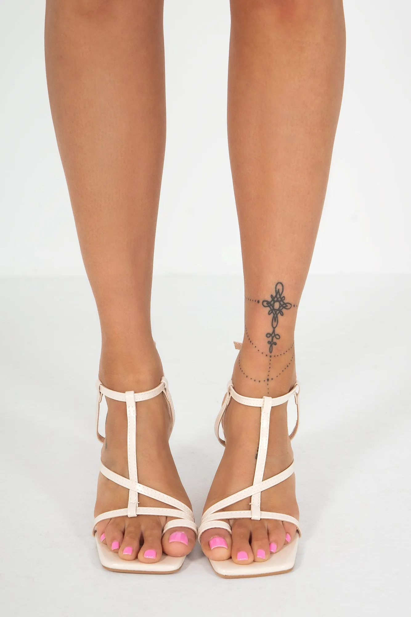 Emory Cream Patent Toe Post Heels